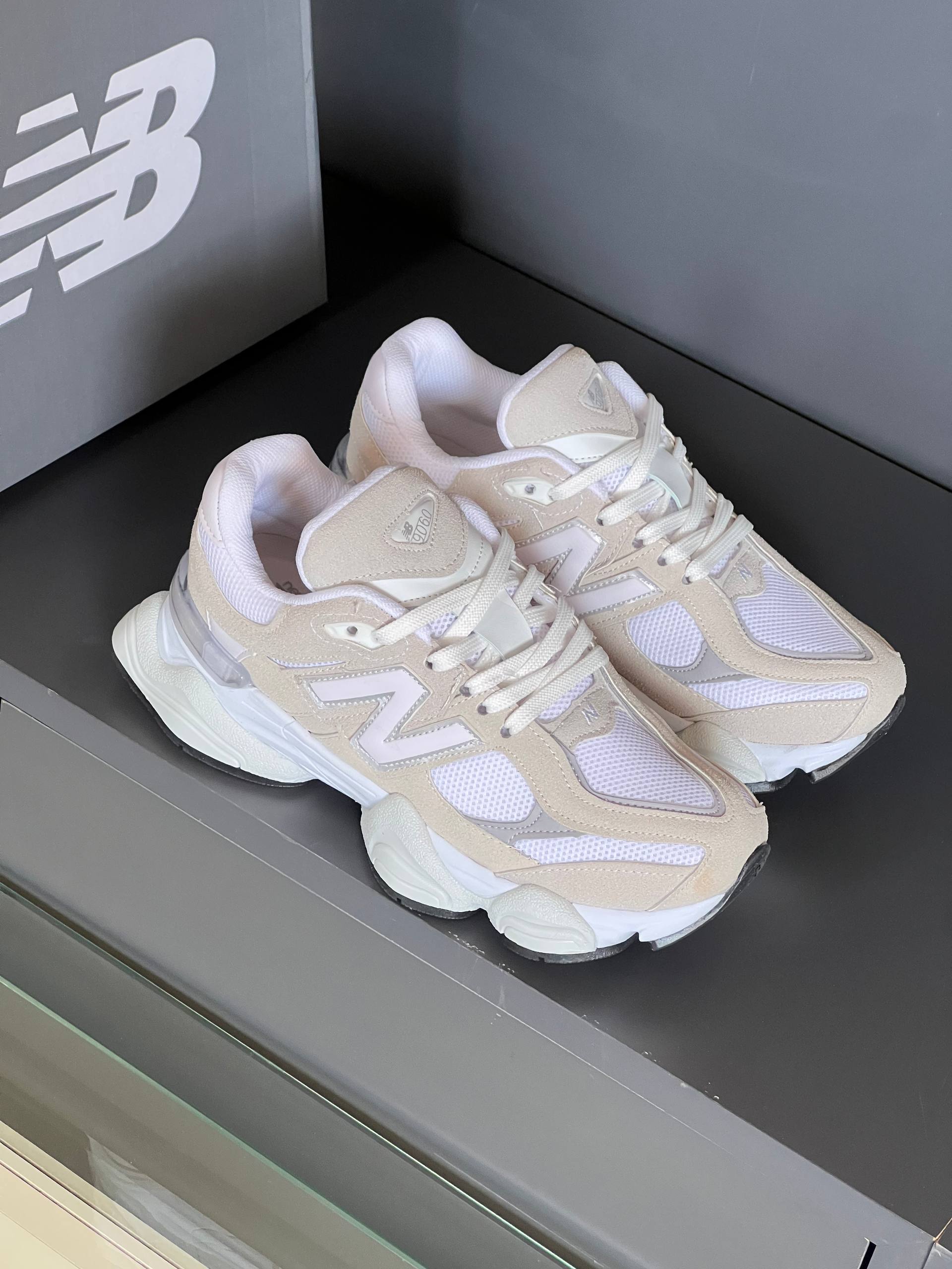 1264FF7B-088B-4C5E-8060-739FE358CD64 New Balance 9060 White Cream Sneakers - Image 1