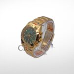C0SMOGRAPH DAYT0NA GOLD GREEN DIAL 40MM - Image 3